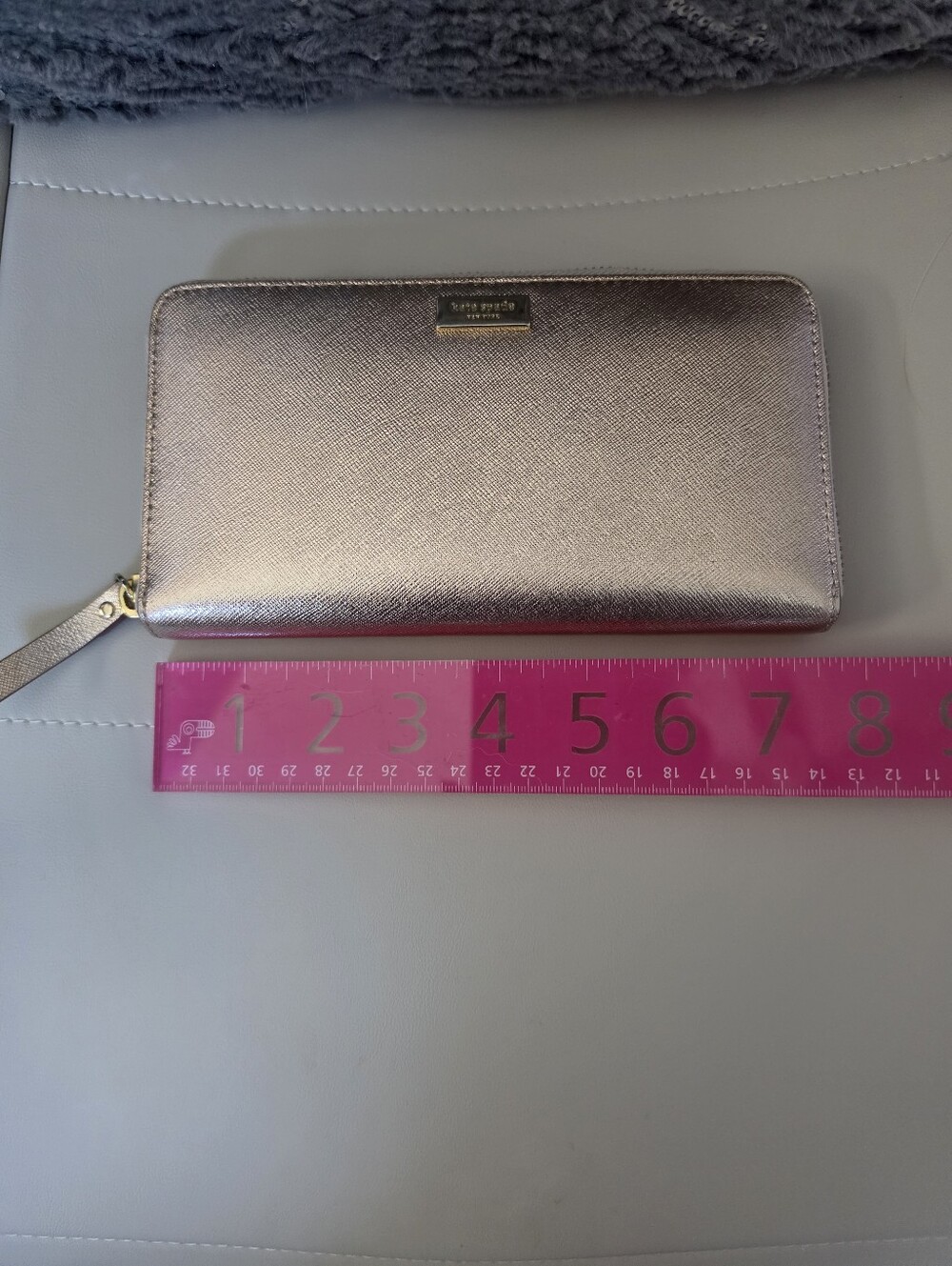 Kate Spade metallic rose wallet in rose gold